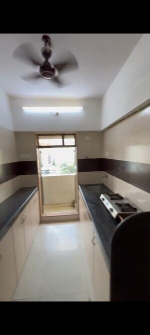 Kitchen in 3 BHK Apartment at Shri Arham Bluz, Andheri West – for Rent