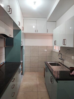 Kitchen in 2 BHK Apartment at Adarsh Greens, Kogilu – for Rent
