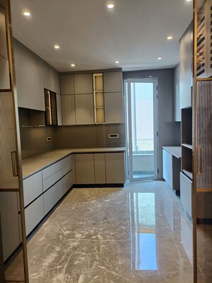 Kitchen in 4 BHK Builder Floor at Suncity – for Sale
