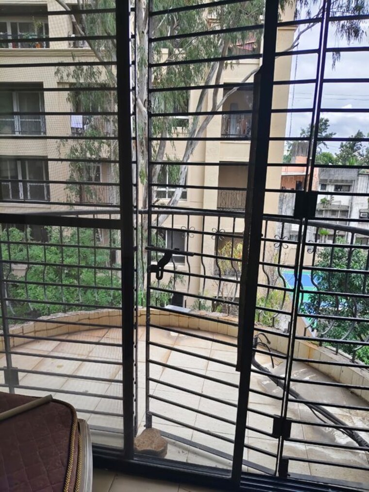Balcony, shirine-garden-co-operative-housing-society-ltd 2 Bedroom 950 Sq.Ft. Apartment In Aundh Pune 10682403
