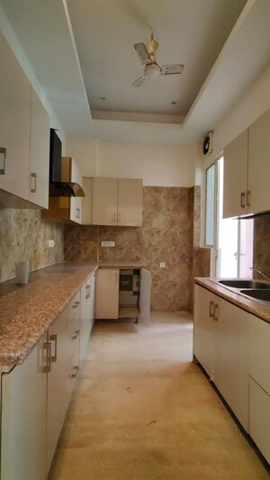 Kitchen in 3 BHK Builder Floor at Ansal API Esencia, Sector 67 – for Rent