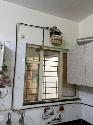 Kitchen in 2 BHK Apartment at Pimple Saudagar – for Sale
