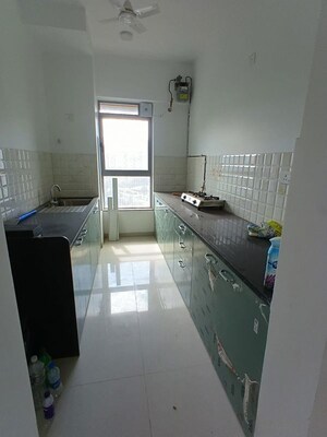 Kitchen in 2 BHK Apartment at Kalpataru Immensa, Kolshet Road – for Rent