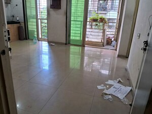 Living Room in 1 BHK Apartment at Sai Prasad Residency CHS Ltd, Kharghar – for Sale