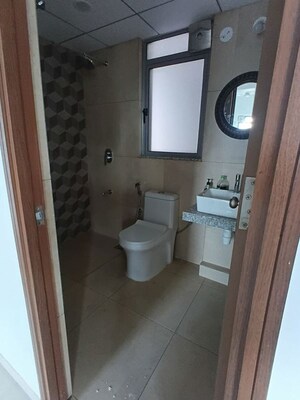 Bathroom in 2 BHK Apartment at Kalpataru Immensa, Kolshet Road – for Rent