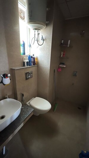 Bathroom in 3 BHK Apartment at Affinity Greens, International Airport Road – for Rent