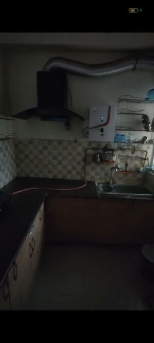 Kitchen in 2 BHK Apartment at Gaur City 2 - 12th Avenue, Sector 16c Greater Noida – for Rent
