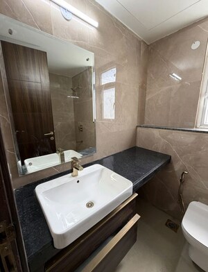 Bathroom in 3 BHK Apartment at Smart World Orchard, Sector 61 – for Rent