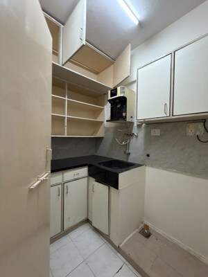 Kitchen in 3 BHK Apartment at Garden Apartments, Vittal Mallya Road – for Rent