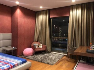 Living Room in 4 BHK Apartment at Panchshil One North, Magarpatta City – for Sale