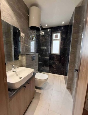 Bathroom in 2 BHK Builder Floor at Ramesh Nagar – for Rent