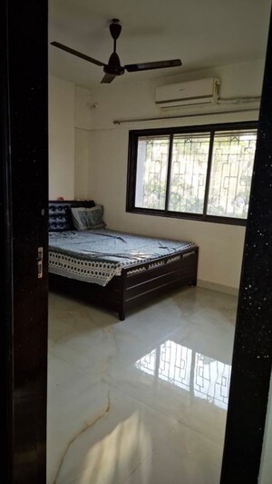 Bedroom in 2 BHK Apartment at Jal Vayu Vihar Apartments, Powai – for Rent