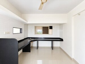 Kitchen in 2 BHK Apartment at GM Kenjale Spring Meadows, Ambegaon Budruk – for Sale