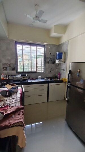 Kitchen in  Pg at Riddhi Gardens CHS, Malad East – for Rent