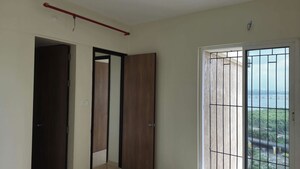 Building Lobby in 2 BHK Apartment at Dosti Tulip, Balkum Pada – for Rent