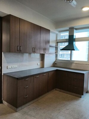 Kitchen in 4 BHK Apartment at Emaar MGF The Palm Drive Villas, Sector 66 – for Sale