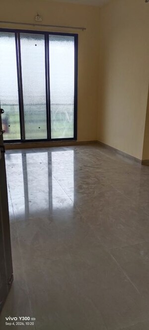 Living Room in 1 BHK Apartment at Jainam Avenue, Ulwe – for Sale