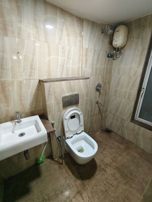 Bathroom in 1 BHK Apartment at Lodha Amara, Kolshet Road – for Rent