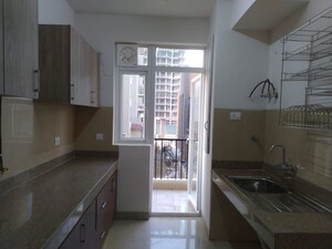 Kitchen in 3 BHK Apartment at Unitech Uniworld Gardens 2, Sector 47 – for Rent