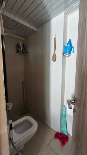 Bathroom in 1 BHK Apartment at Kanakia Rainforest, Andheri East – for Rent