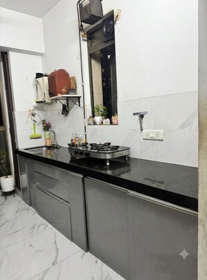 Kitchen in 2 BHK Apartment at Raymond Ten X Habitat, Pokhran Road No Two – for Rent
