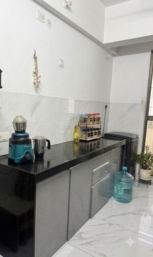 Kitchen in 2 BHK Apartment at Raymond Ten X Habitat, Pokhran Road No Two – for Rent