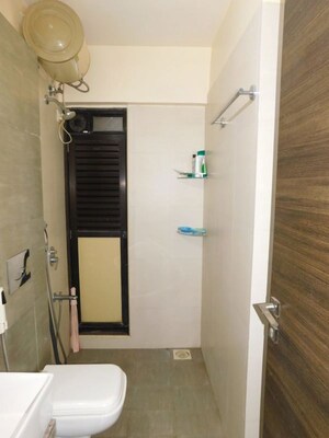 Bathroom in 2 BHK Apartment at Kanakia Rainforest, Andheri East – for Sale