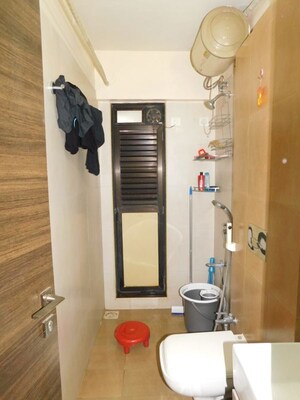 Bathroom in 2 BHK Apartment at Kanakia Rainforest, Andheri East – for Sale