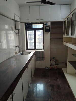 Kitchen in 2 BHK Apartment at Triveni Vasant Vihar CHS, Vasant Vihar – for Rent