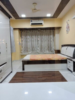 Bedroom in 2 BHK Apartment at Gahlot Majesty and Avenue CHS, Seawoods – for Rent