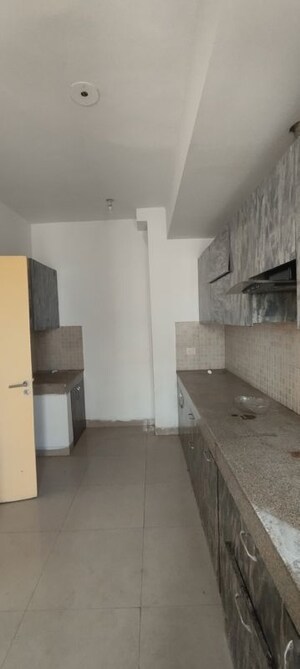 Kitchen in 4 BHK Apartment at Emaar Gurgaon Greens, Sector 102 – for Rent