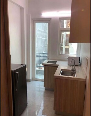 Kitchen in 1 RK Apartment at Suncity Heights, Sector 54 – for Rent