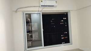 Room in 1 BHK Apartment at Ruparel Elara, Kandivali West – for Rent
