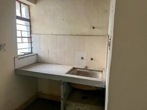 Kitchen in  Apartment at Narela – for Sale