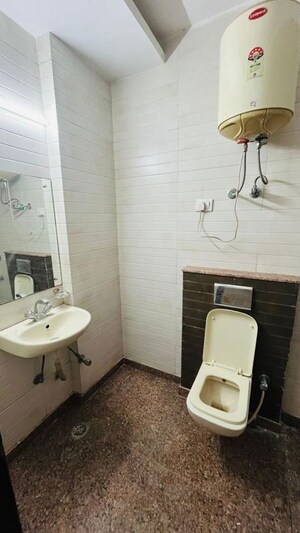 Bathroom in 2 BHK Builder Floor at Kalkaji – for Rent