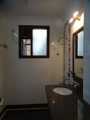 Bathroom in 3 BHK Builder Floor at New Friends Colony – for Rent