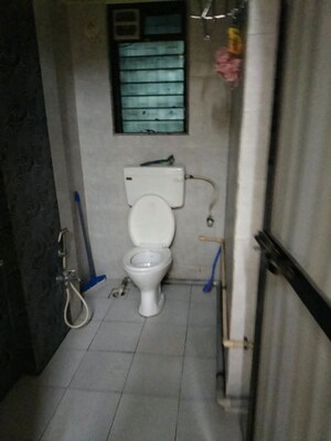 Bathroom in 2 BHK Apartment at Sudarshan CHS Parel, Parel – for Rent