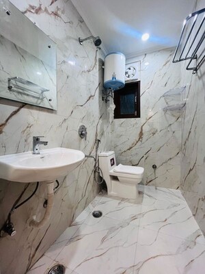 Bathroom in 1 BHK Apartment at Freedom Fighters Enclave – for Rent