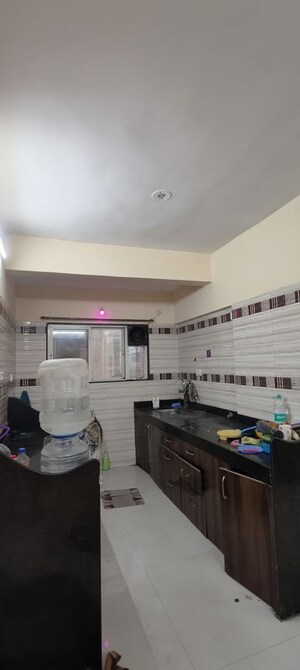 Kitchen in 2 BHK Apartment at GK Peace Valley, Pimple Saudagar – for Sale