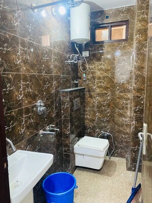 Bathroom in 3 BHK Builder Floor at Dwarka Mor – for Rent