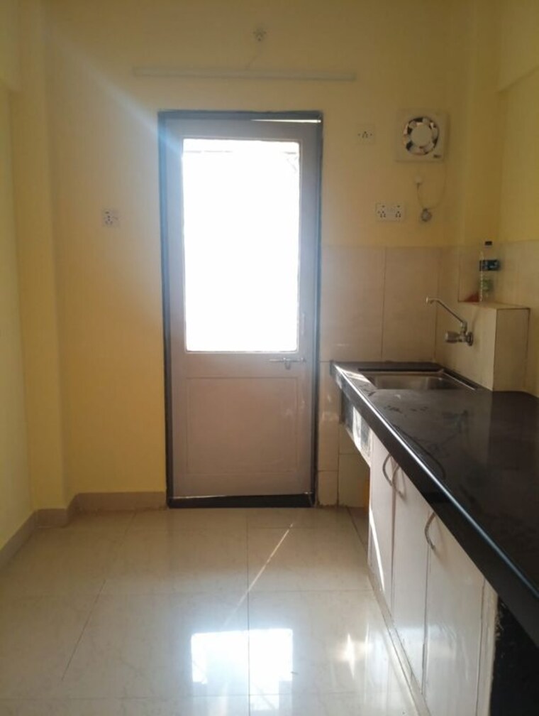 Kitchen, shraddha-apartments-malad-east 1 Bedroom 400 Sq.Ft. Apartment In Malad East Mumbai 10683896
