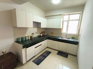 Kitchen in 3 BHK Apartment at ROF Aalayas, Sector 102 – for Sale