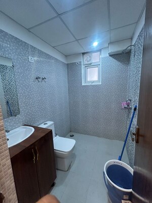 Bathroom in 2 BHK Apartment at Tulsiani Urban Woods, Sushant Golf City – for Rent