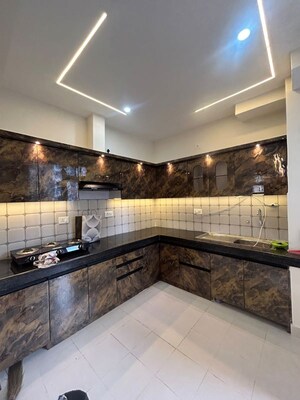 Kitchen in 2 BHK Apartment at Tulsiani Urban Woods, Sushant Golf City – for Rent