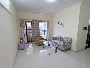 Living Room in 2 BHK Apartment at Infiniti Mall, Andheri West – for Rent