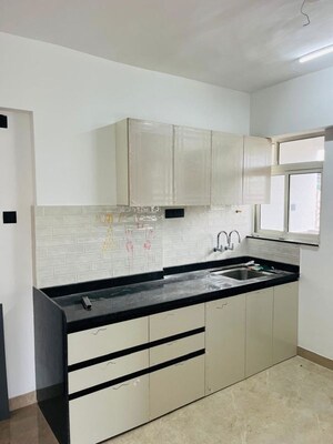 Kitchen in 2 BHK Apartment at Skyrise Sparkle, Dhanori – for Rent