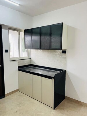 Kitchen in 2 BHK Apartment at Skyrise Sparkle, Dhanori – for Rent
