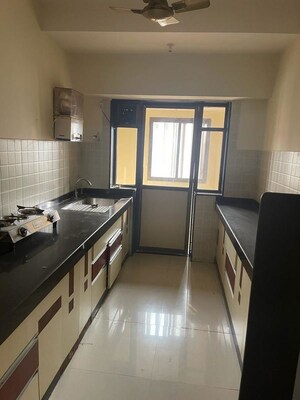 Kitchen in 3 BHK Apartment at Evershine Cosmic, Andheri West – for Rent