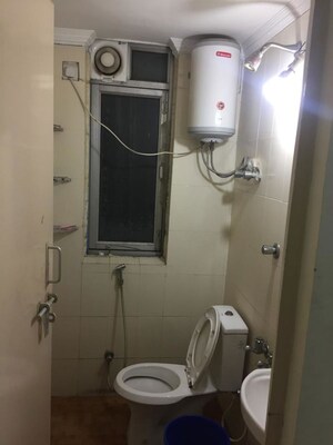 Bathroom in 1 RK Apartment at Mahindra Aura, Sector 110a – for Rent