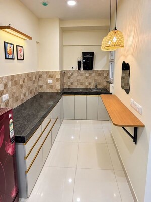 Kitchen in Studio Apartment at Puravankara Silversands, Mundhwa – for Rent